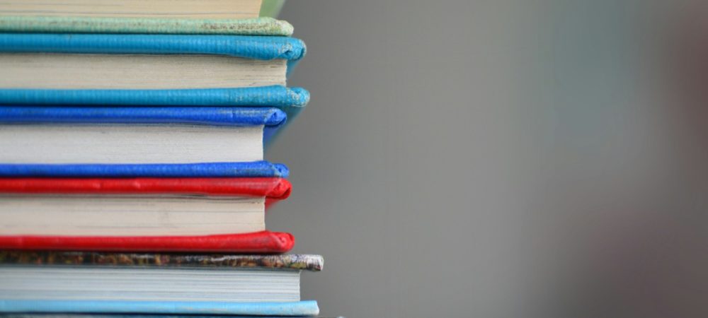 shallow focus photography of books