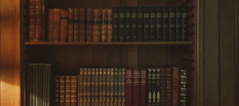 a book shelf filled with lots of books